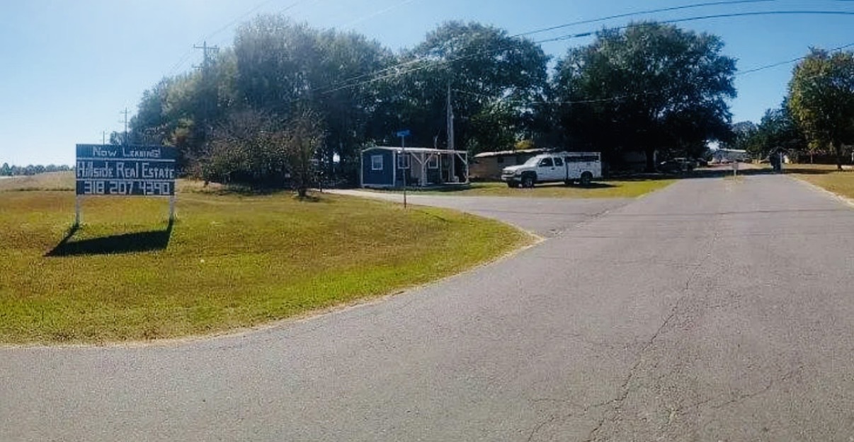 Entrance and roadway of the Hillside Circle rental community in Stonewall Louisiana